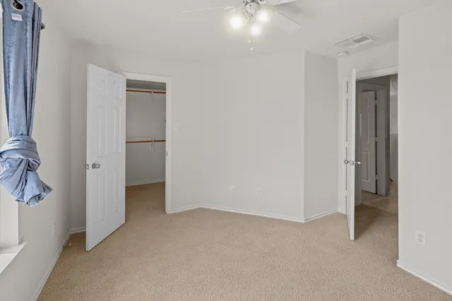 a bathroom with a sink a toilet a shower and a mirror