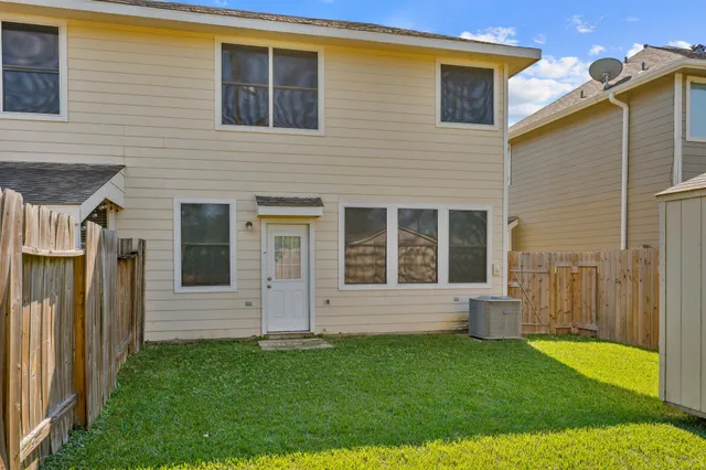 a view of a backyard with plants