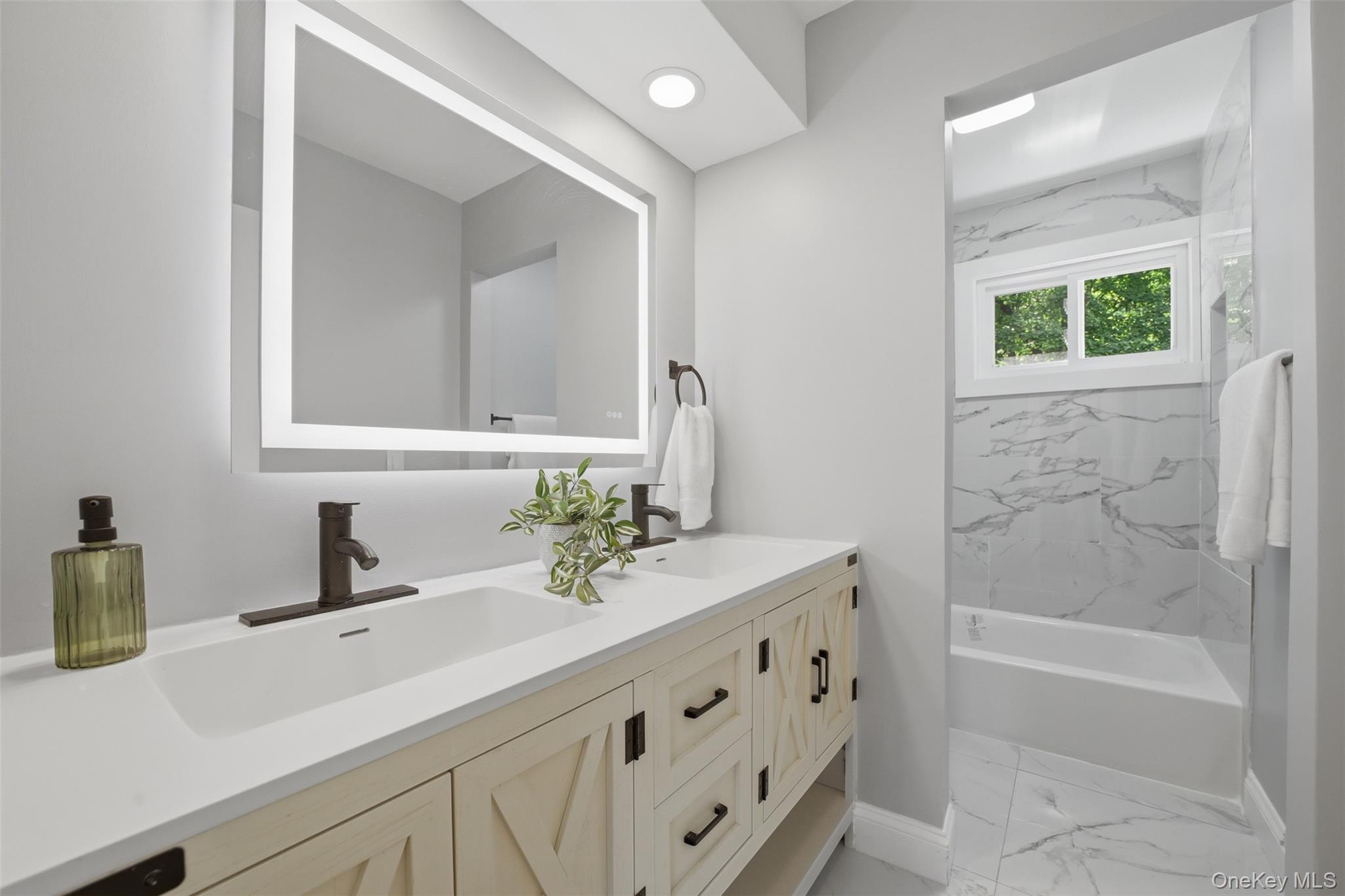 24 Fuller Road Ossining, NY 10562 - Photo 22 of 48 a bathroom with a sink and a mirror