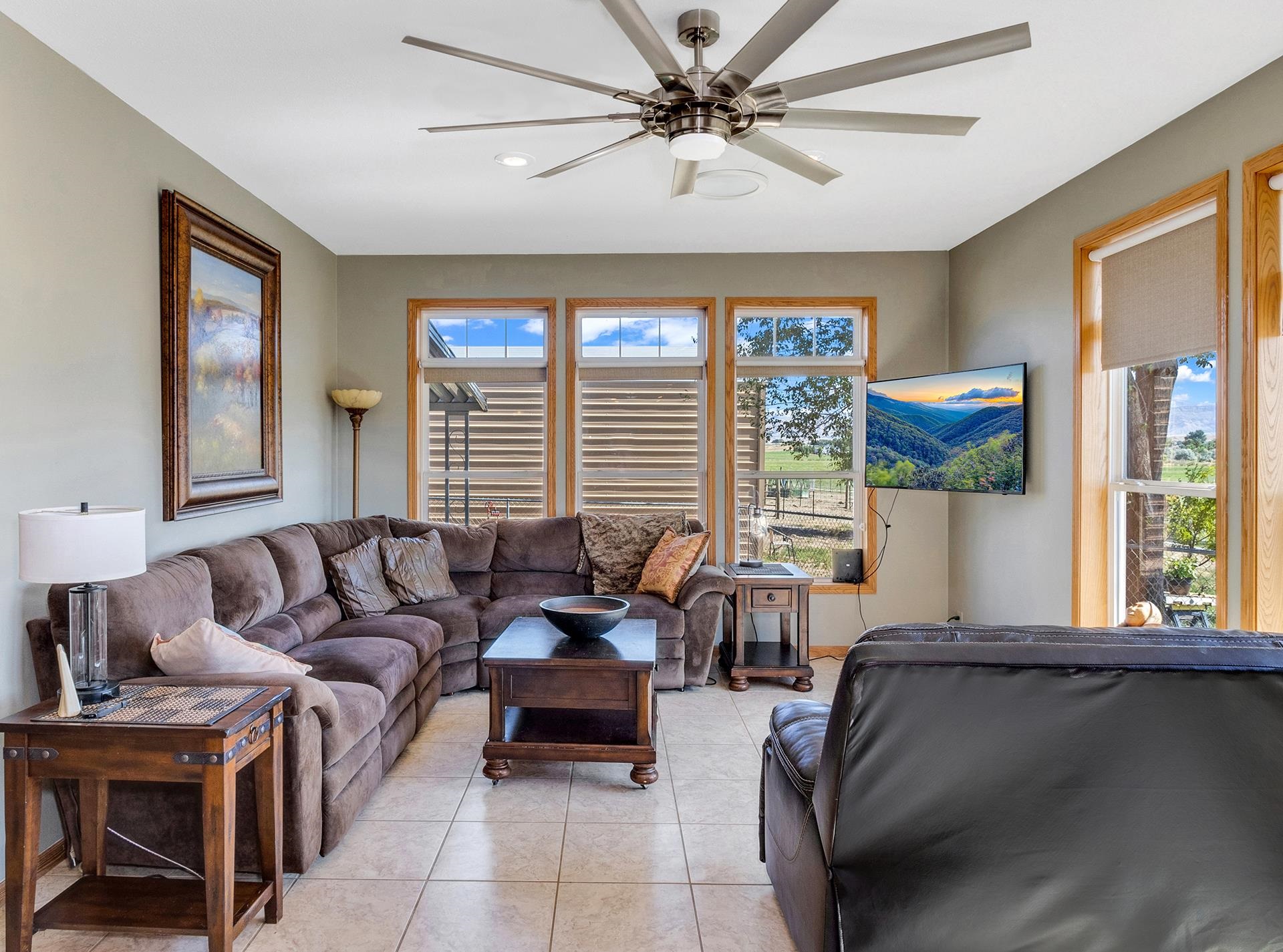 1724 O Road Fruita, CO 81521 - Photo 12 of 42 a living room with furniture and a window