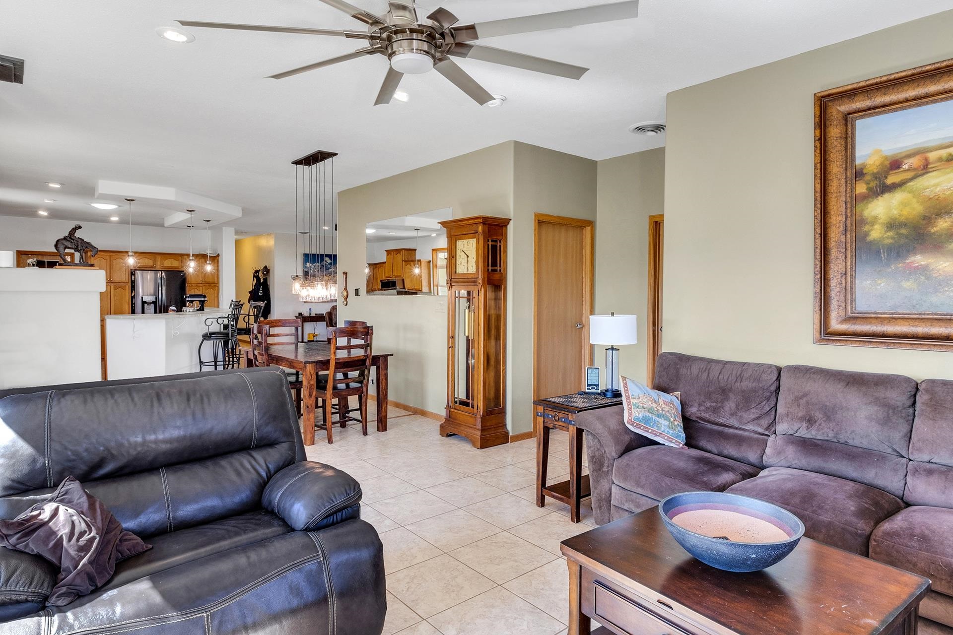1724 O Road Fruita, CO 81521 - Photo 14 of 42 a living room with furniture and a large window