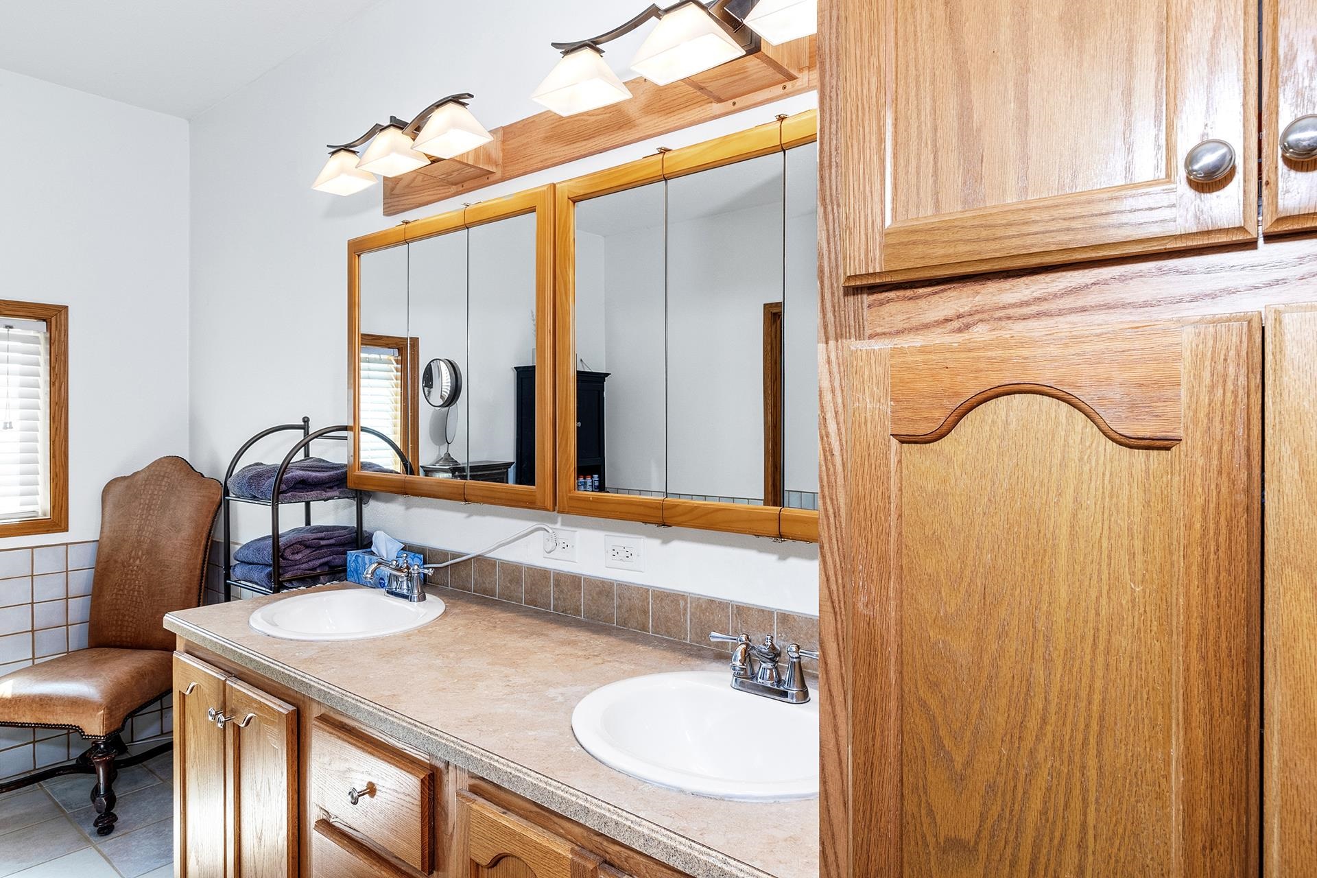 1724 O Road Fruita, CO 81521 - Photo 17 of 42 a bathroom with a sink vanity granite and a mirror