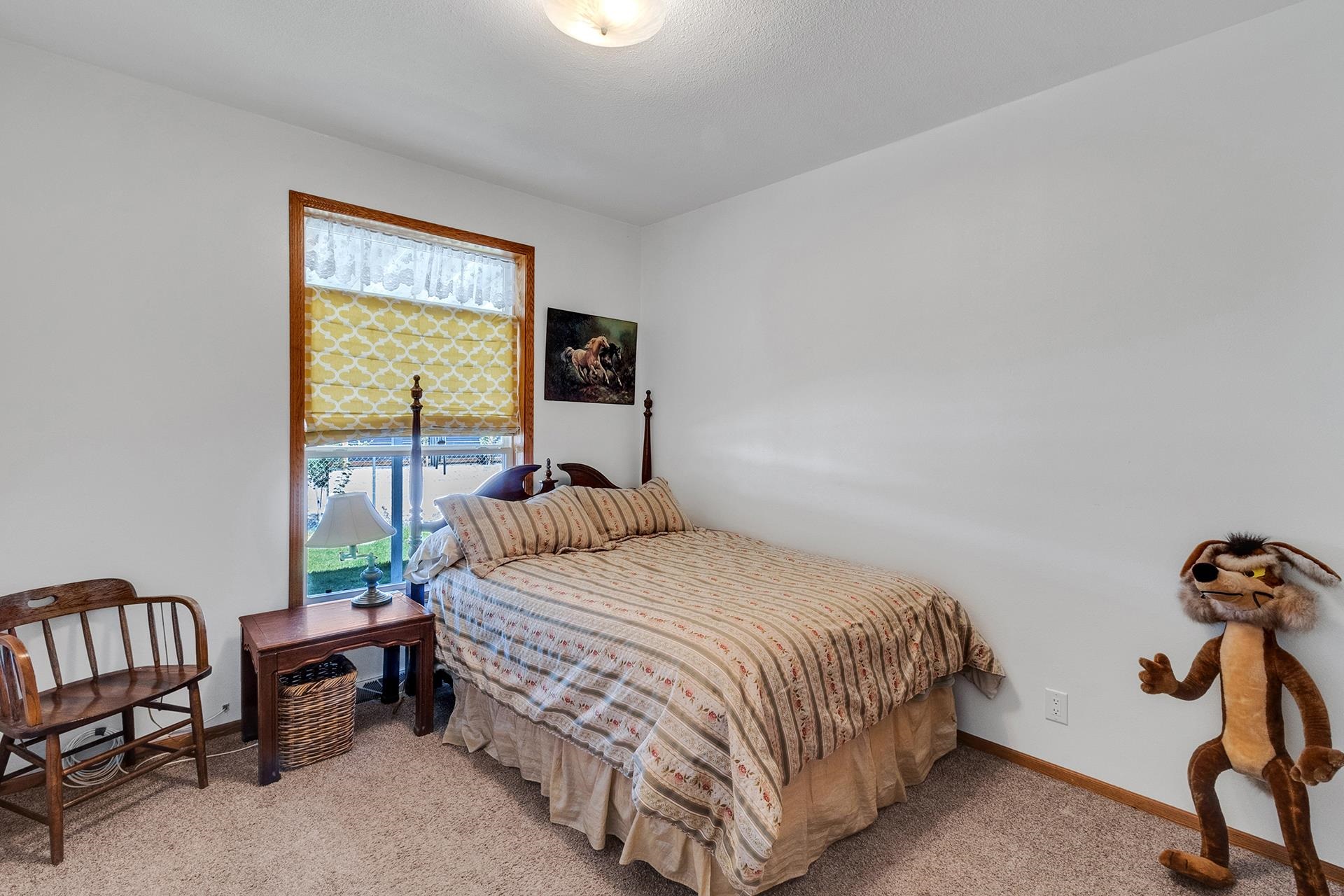 1724 O Road Fruita, CO 81521 - Photo 19 of 42 a bedroom with a bed and a window