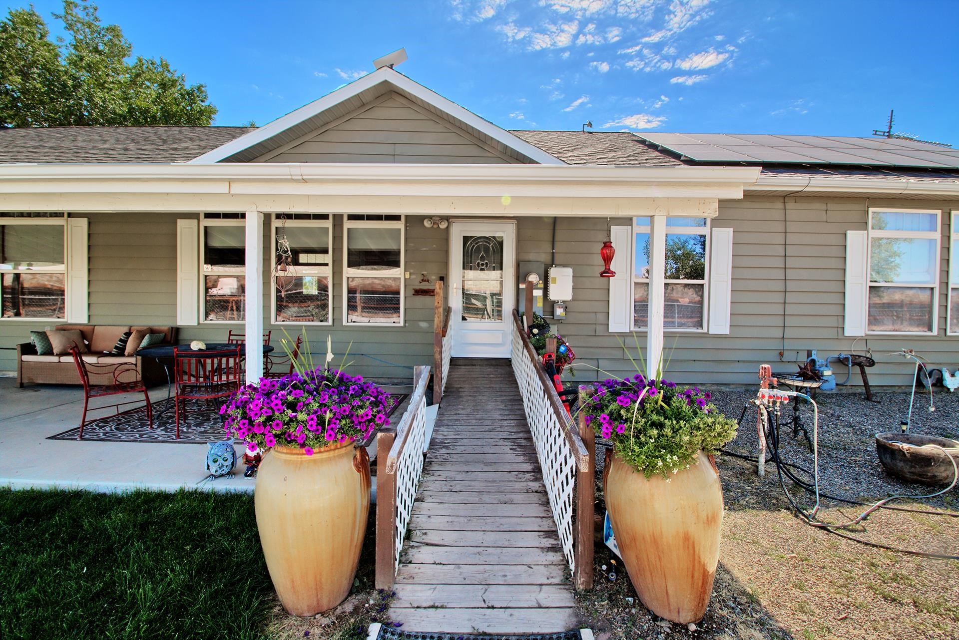1724 O Road Fruita, CO 81521 - Photo 3 of 42 a view of a house with sitting area