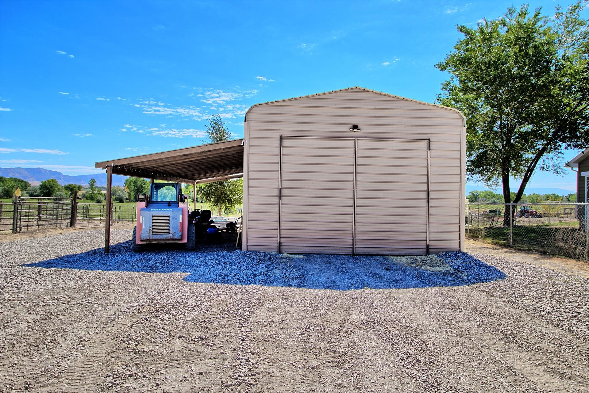 1724 O Road Fruita, CO 81521 - Photo 31 of 42 a view of a house with a yard