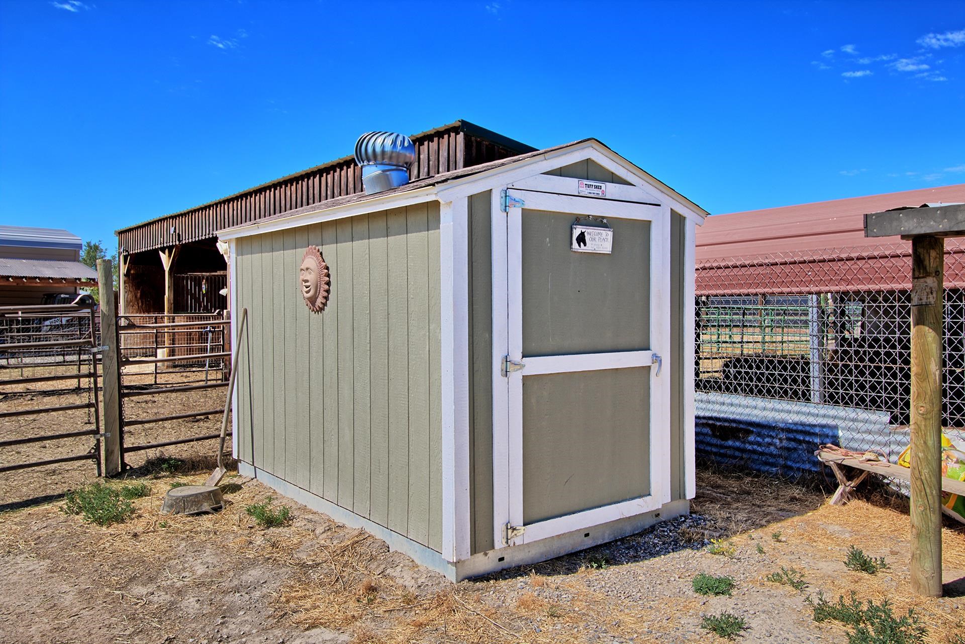 1724 O Road Fruita, CO 81521 - Photo 35 of 42 a view of a wooden house with a large window