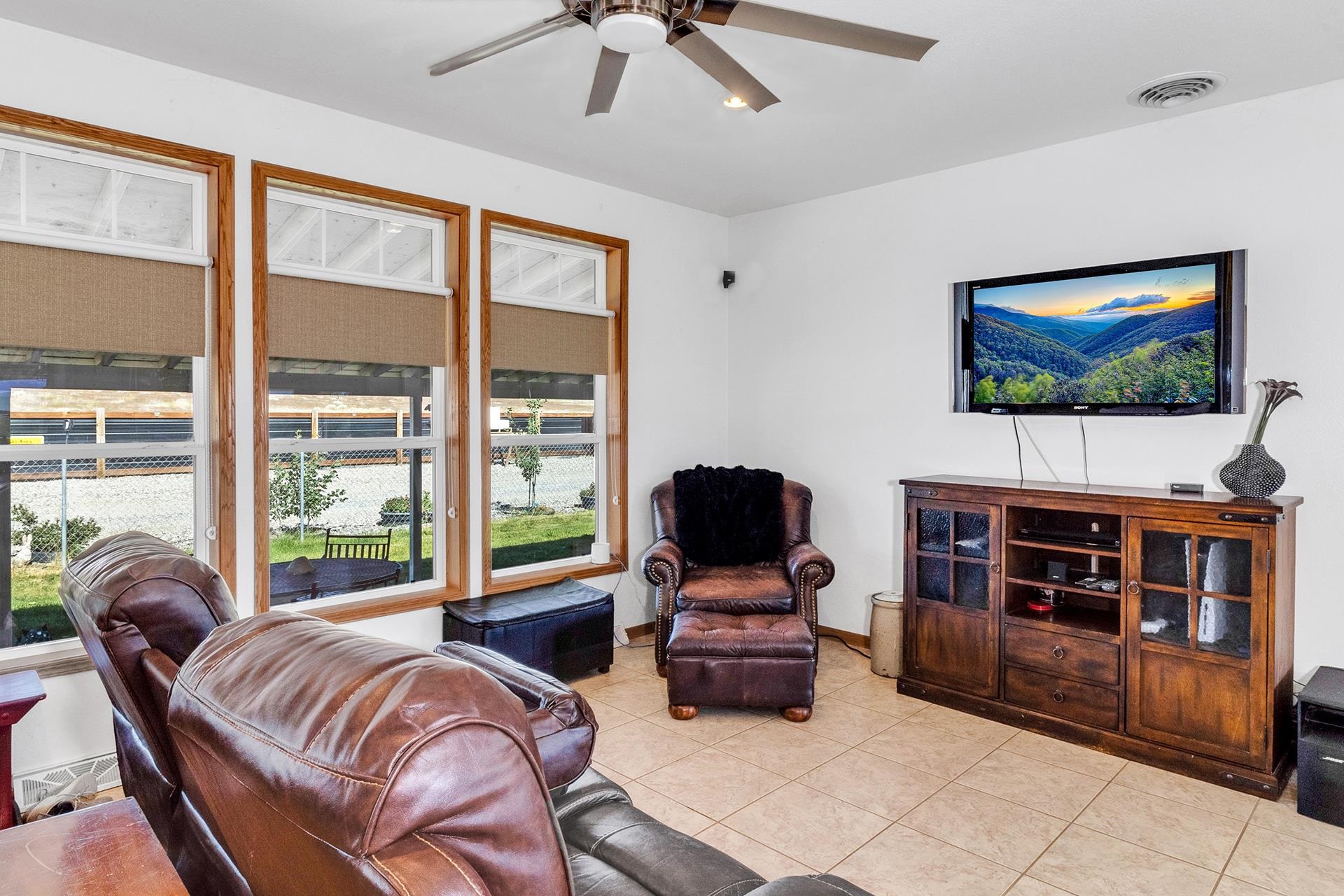 1724 O Road Fruita, CO 81521 - Photo 6 of 42 a living room with furniture and a flat screen tv
