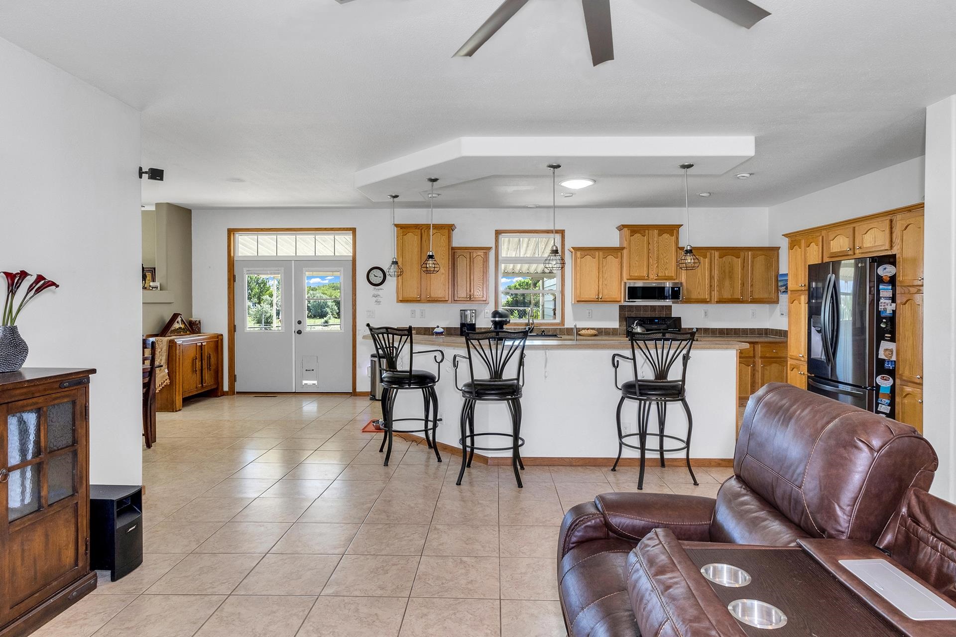 1724 O Road Fruita, CO 81521 - Photo 7 of 42 a living room with furniture and large windows