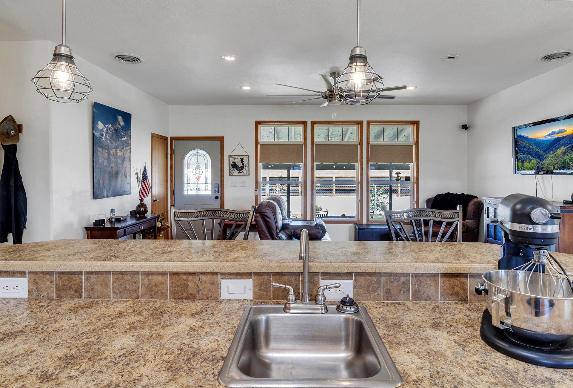 1724 O Road Fruita, CO 81521 - Photo 10 of 42 a view of kitchen with granite countertop a sink and a chandelier