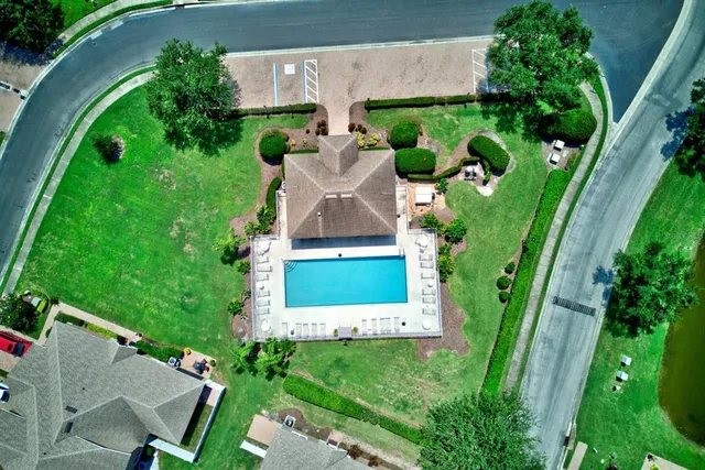 an aerial view of residential house with outdoor space and street view