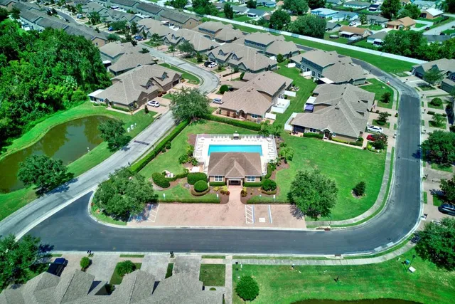 a view of swimming pool from a balcony