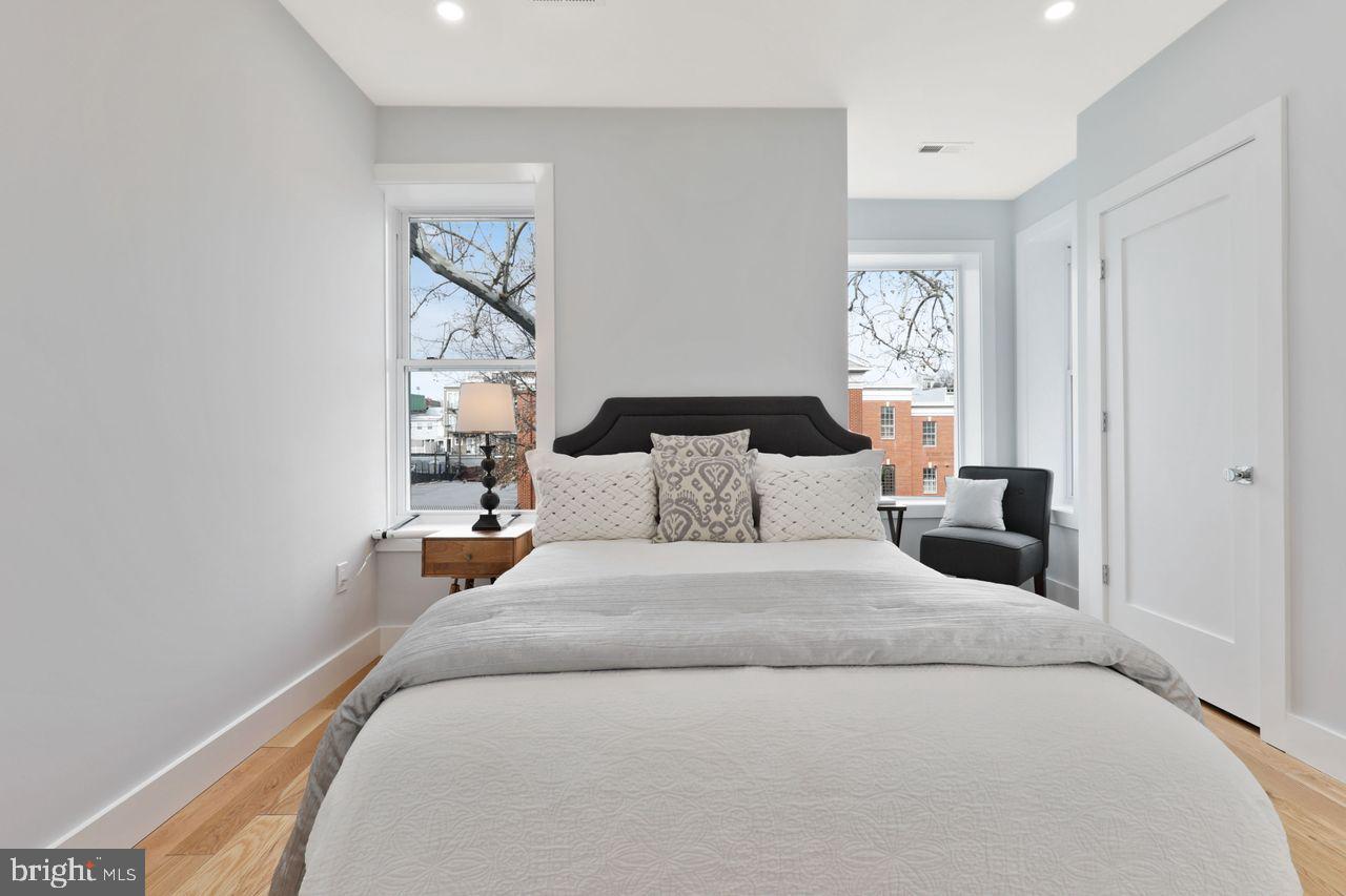 1023 Florida Avenue Northeast Washington, DC 20002 - Photo 16 of 24 a bedroom with bed and a window