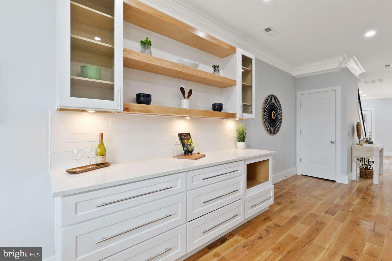 1023 Florida Avenue Northeast Washington, DC 20002 - Photo 7 of 24 a kitchen with stainless steel appliances a cabinets and window