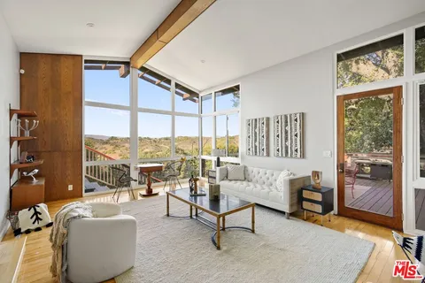 a backyard of a house with seating space