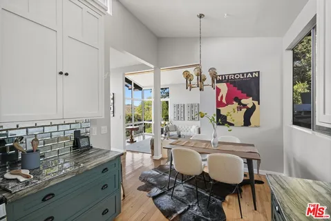 a bathroom with a double vanity sink toilet and shower