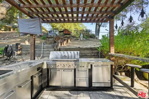 a view of a door and chair in a room