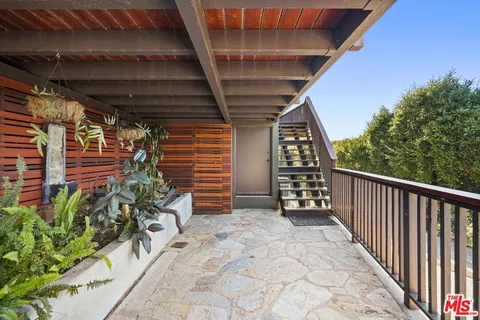 a view of front door and bedroom