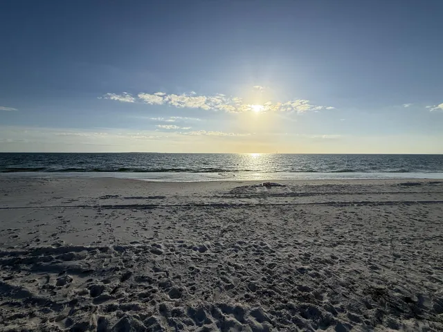 a view of a lake with a building in the background