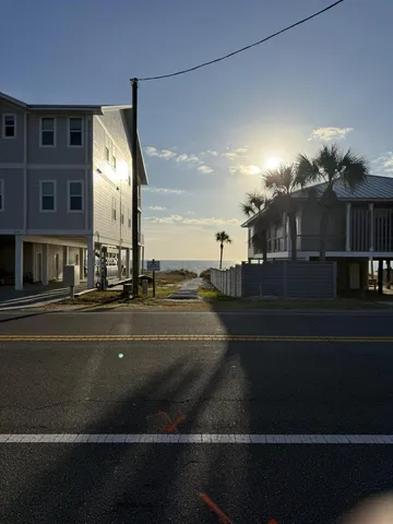 a view of a street with building