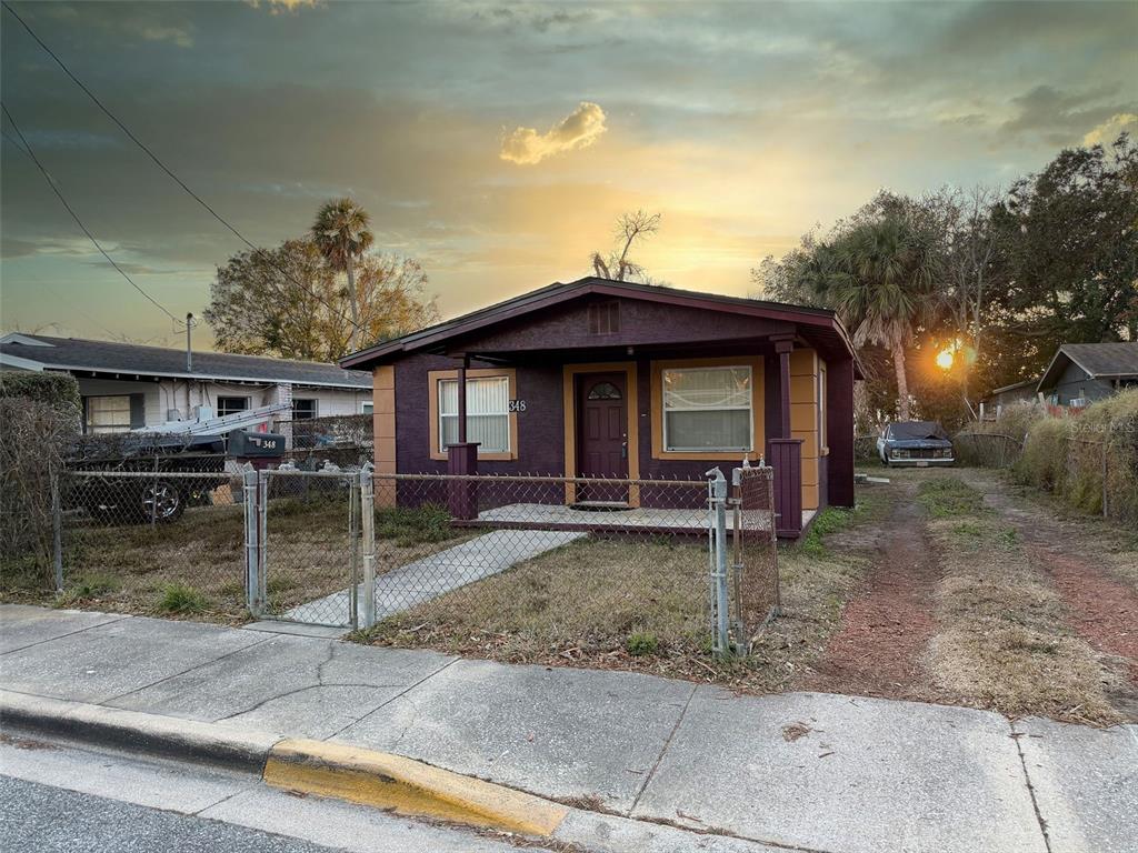 348 Pleasant Street Daytona Beach, FL 32114 - Photo 12 of 12 a front view of a house with a porch