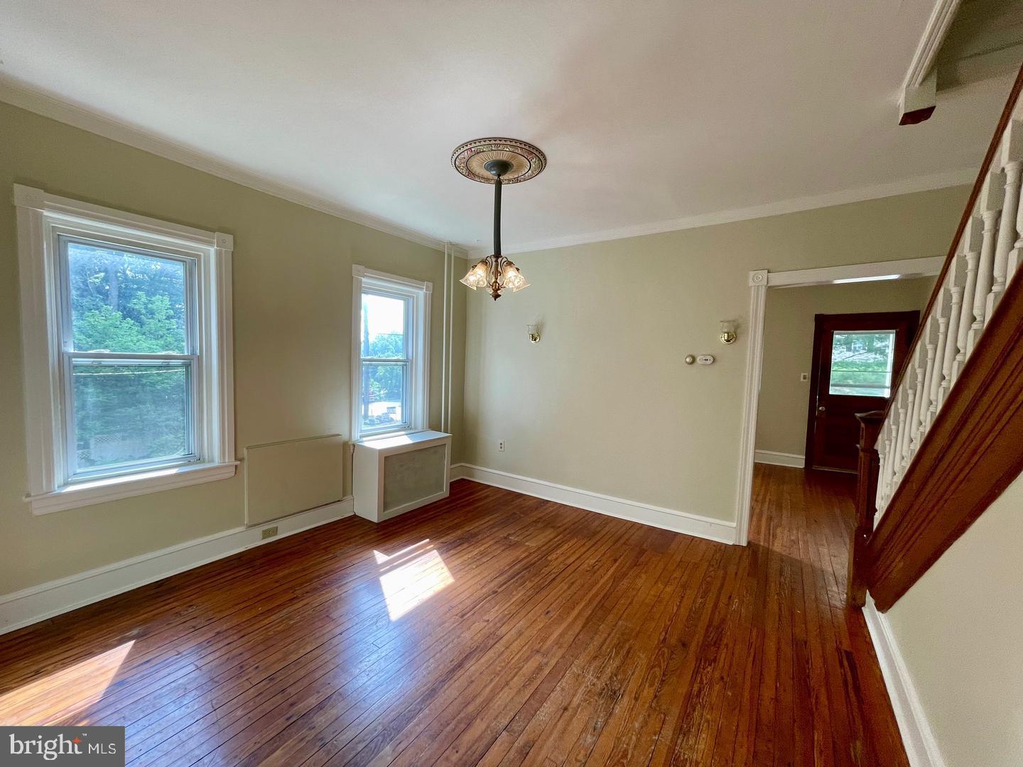 692 Lenni Road Aston, PA 19014 - Photo 5 of 28 a view of empty room with wooden floor and fan