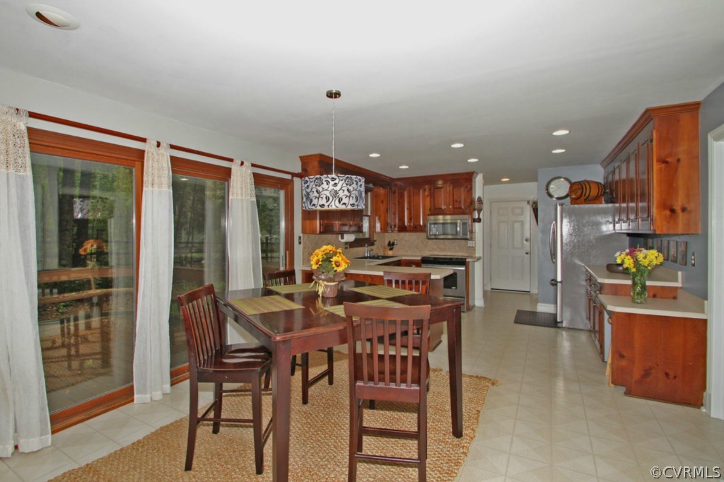 13601 Timber Ridge Court Midlothian, VA 23112 - Photo 6 of 21 a view of a dining room with furniture