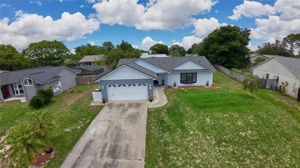 119 Ridgecrest Drive Eustis, FL 32726 - Photo 2 of 52 a front view of a house with garden