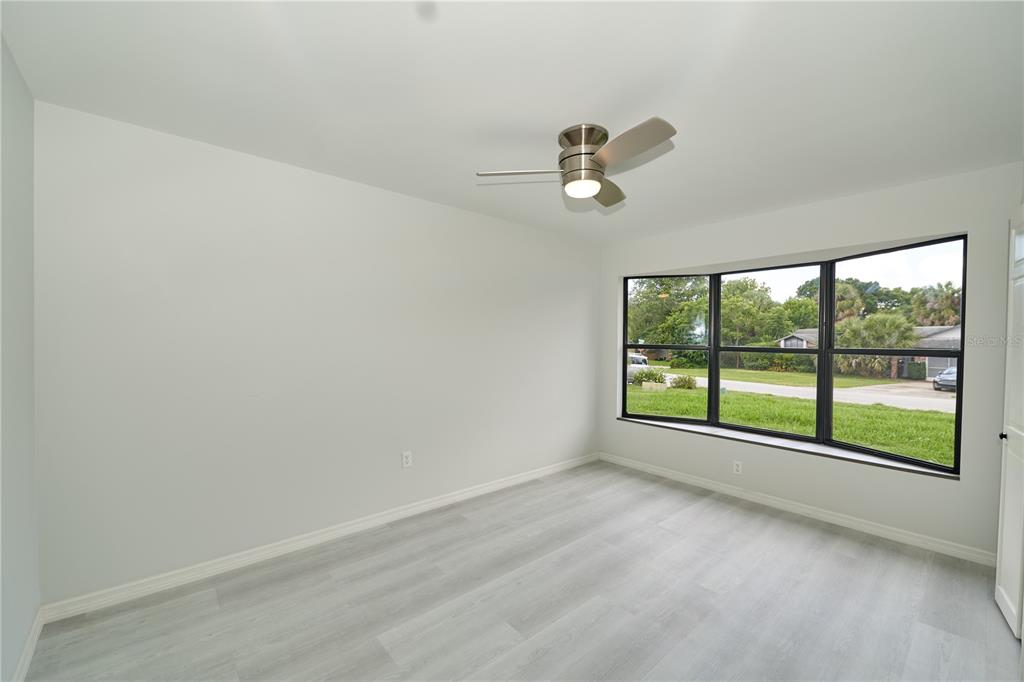 119 Ridgecrest Drive Eustis, FL 32726 - Photo 39 of 52 an empty room with windows