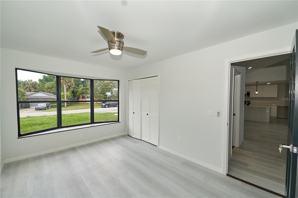 119 Ridgecrest Drive Eustis, FL 32726 - Photo 40 of 52 wooden floor in an empty room with a window