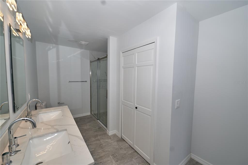 119 Ridgecrest Drive Eustis, FL 32726 - Photo 46 of 52 a bathroom with a sink and mirror