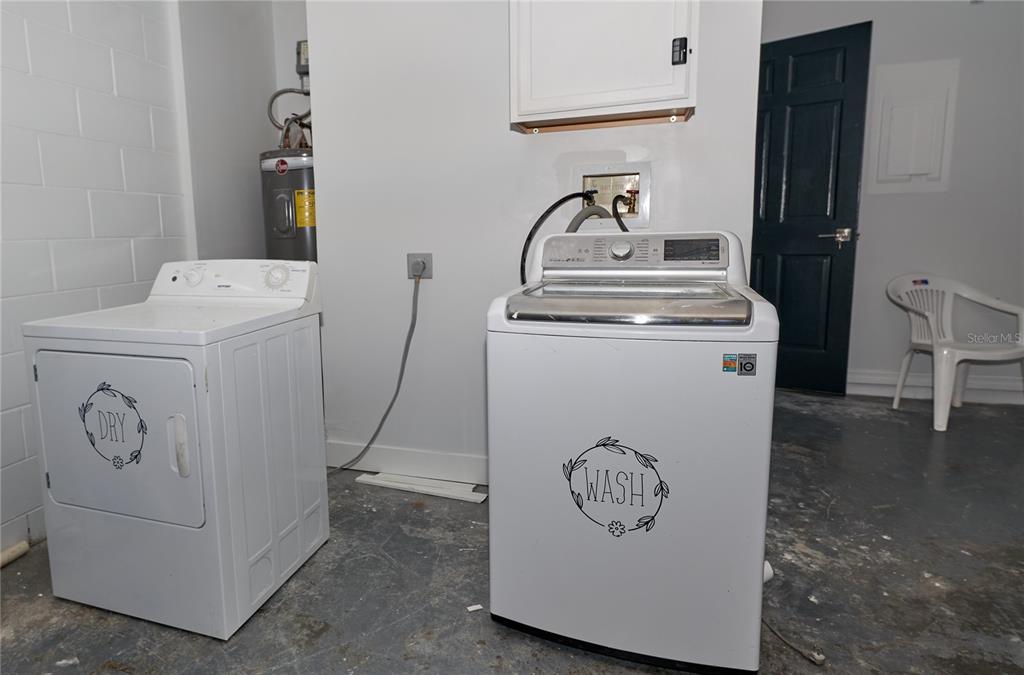 119 Ridgecrest Drive Eustis, FL 32726 - Photo 50 of 52 a utility room with dryer and washer