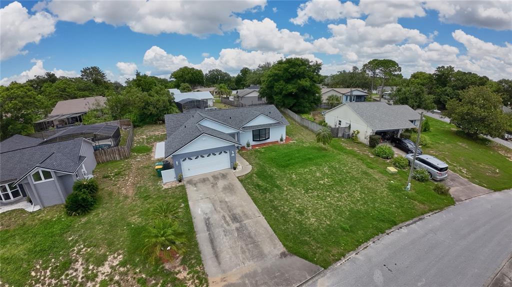 119 Ridgecrest Drive Eustis, FL 32726 - Photo 6 of 52 an aerial view of multiple houses with a yard