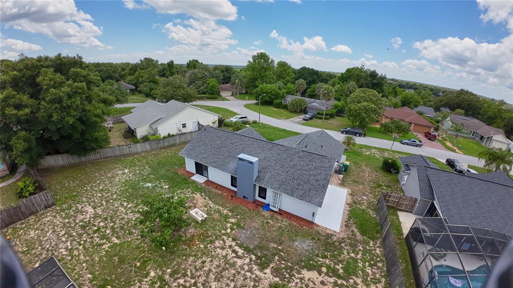 119 Ridgecrest Drive Eustis, FL 32726 - Photo 8 of 52 an aerial view of a house with a garden