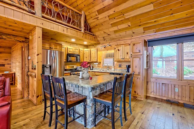 a room with furniture and wooden floor