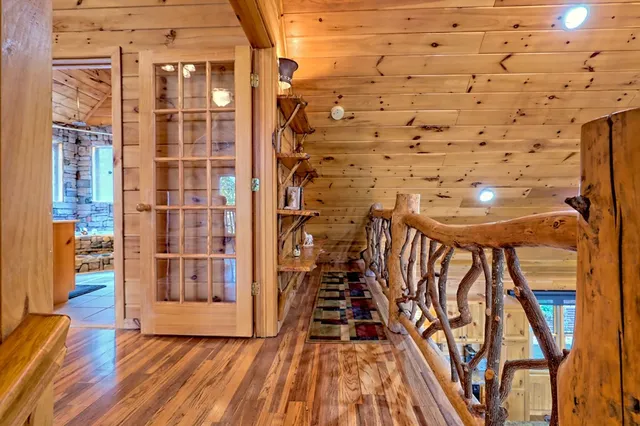 a bathroom with a double vanity sink and shower