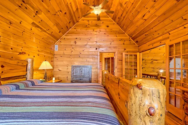 a balcony with furniture and wooden floor