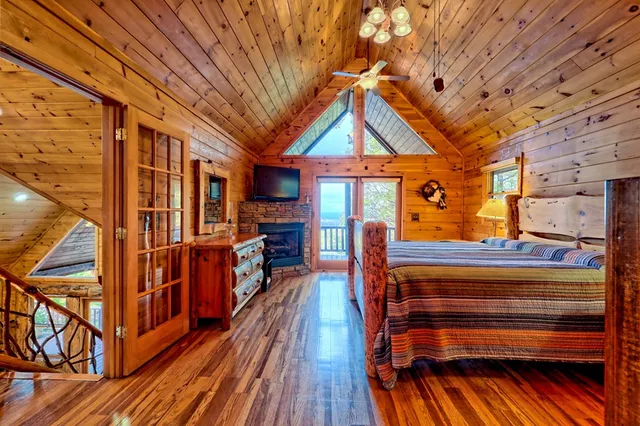 a balcony with wooden floor and fence