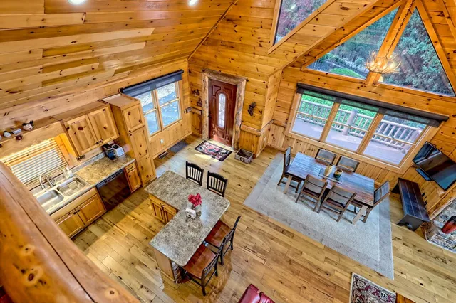 a view of a house with a yard and plants