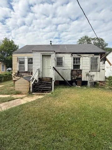 a house view with a garden space