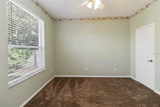 a view of a room that has a window in it