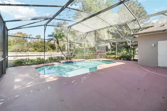 a view of outdoor space with playground and green space