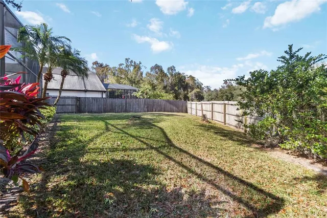 a view of swimming pool with a yard