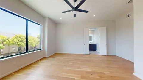 a white bath tub sitting next to a white sink