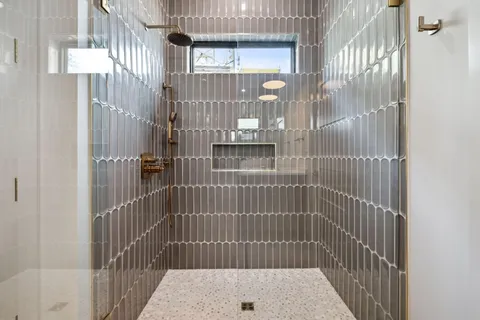 an open kitchen with a table and chairs in it