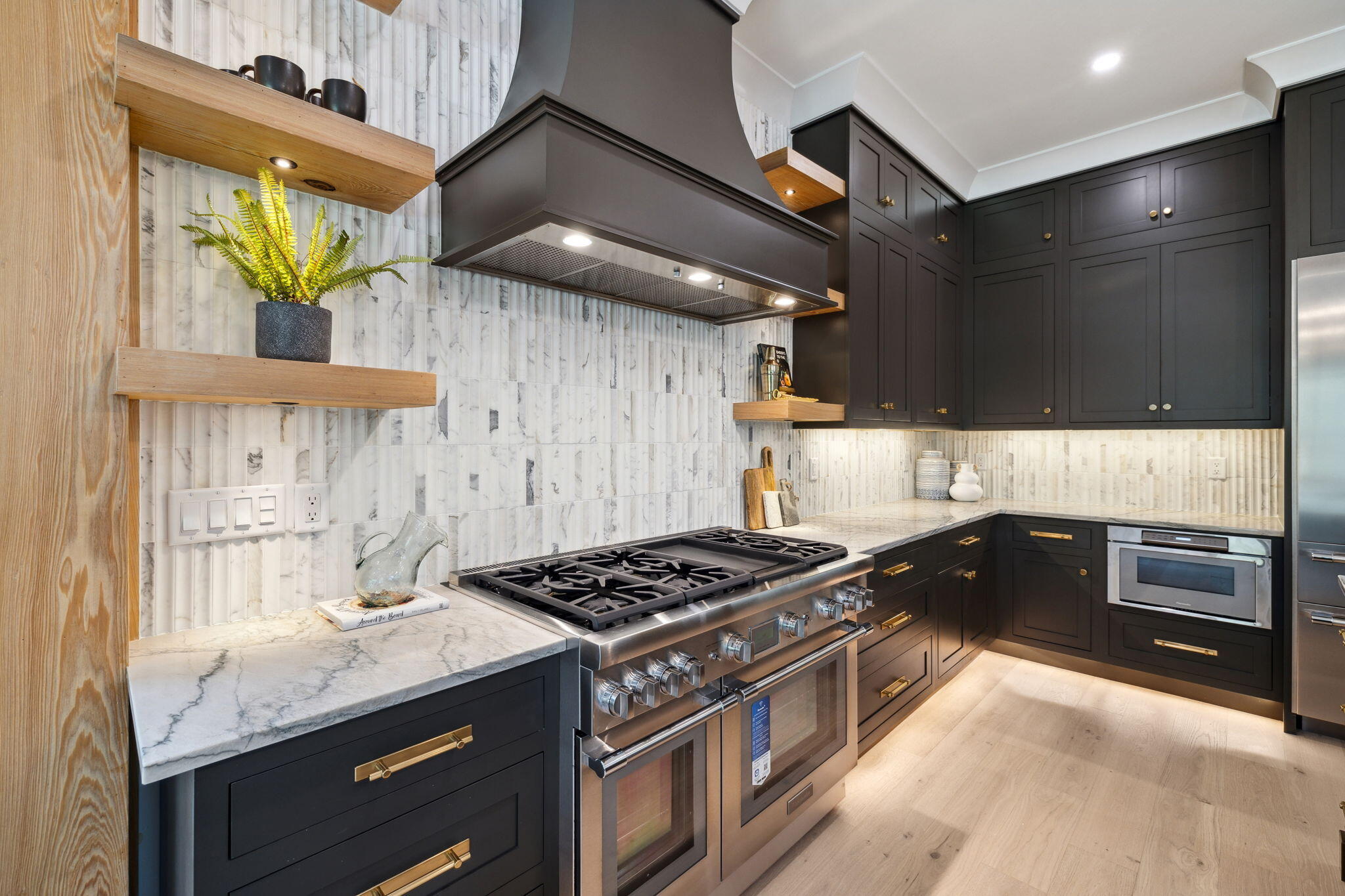 20 Loon Lake Drive Santa Rosa Beach, FL 32459 - Photo 16 of 54 a kitchen with stainless steel appliances granite countertop a stove and a sink