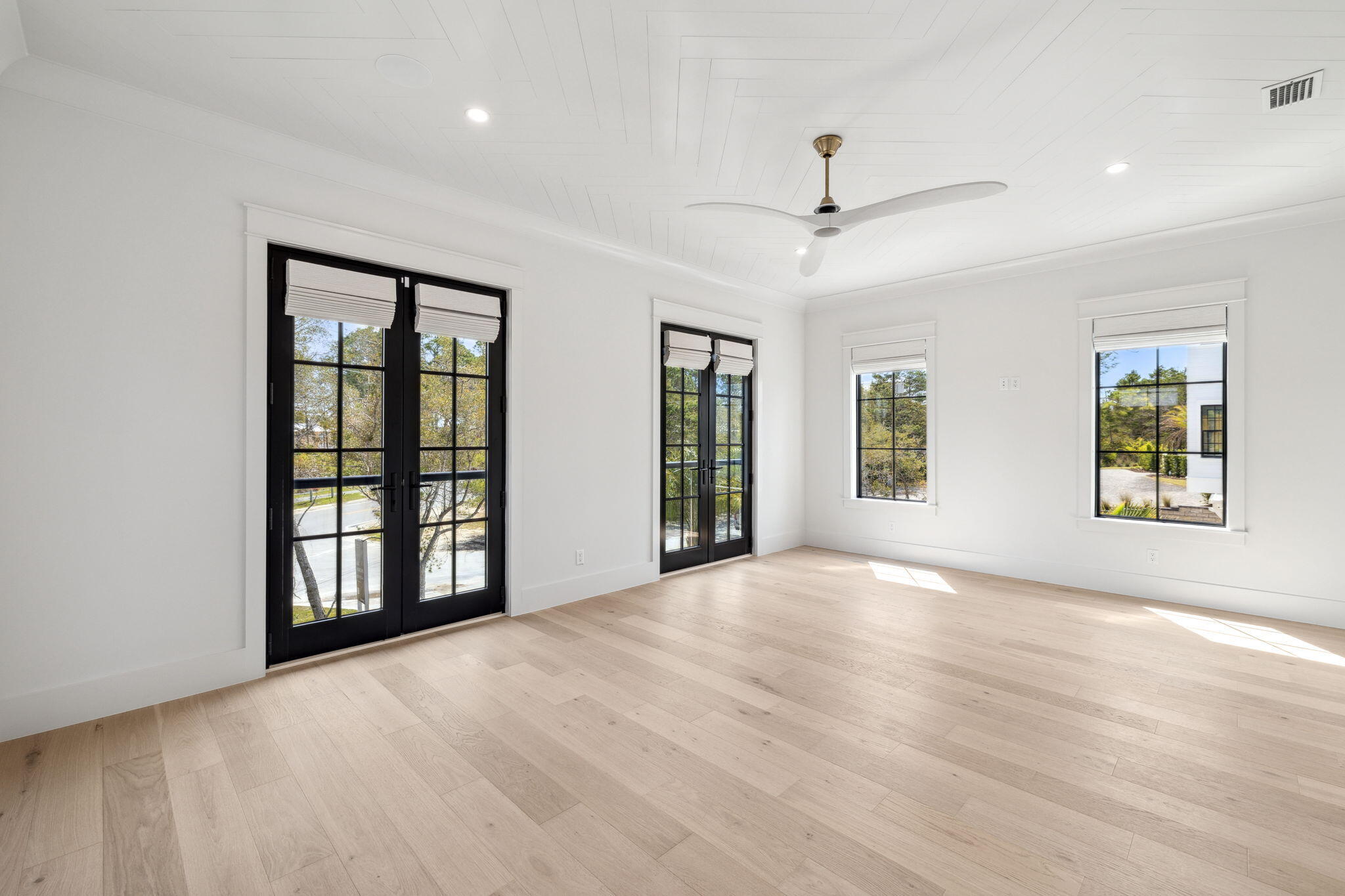 20 Loon Lake Drive Santa Rosa Beach, FL 32459 - Photo 25 of 54 a view of an empty room with a window and wooden floor