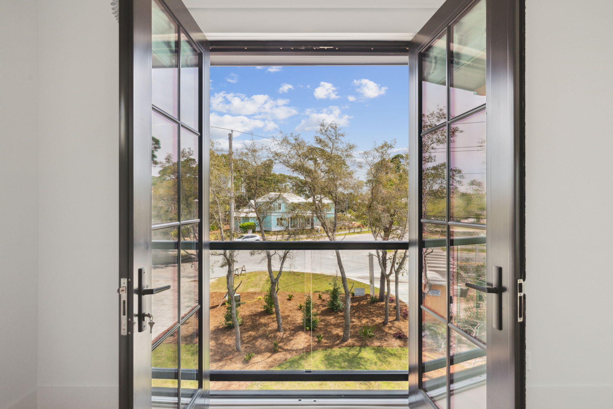20 Loon Lake Drive Santa Rosa Beach, FL 32459 - Photo 26 of 54 a view of a glass door with a glass door