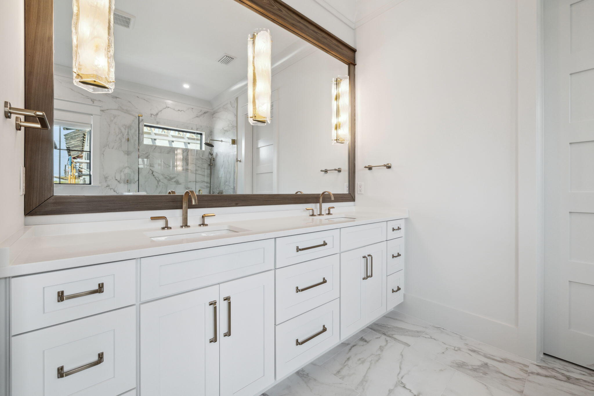 20 Loon Lake Drive Santa Rosa Beach, FL 32459 - Photo 27 of 54 a bathroom with a double vanity sink and a mirror