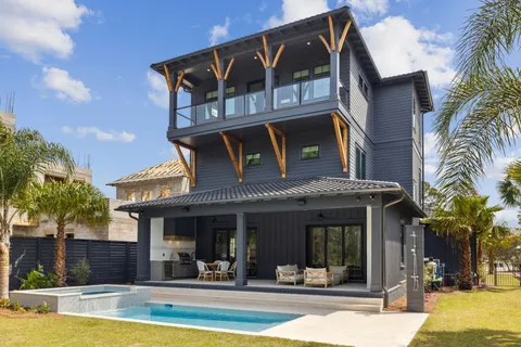 a kitchen with a table and chairs in it