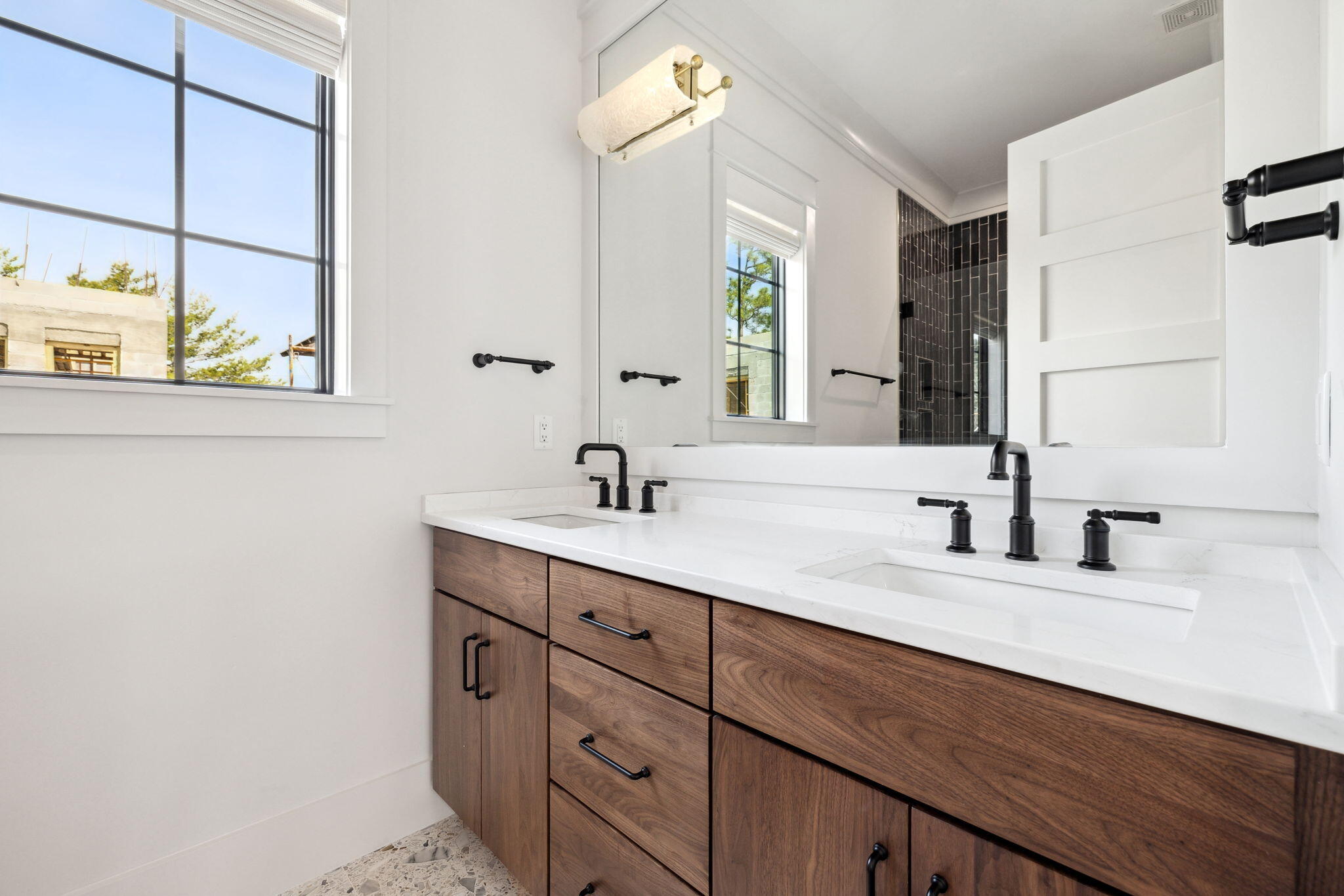 20 Loon Lake Drive Santa Rosa Beach, FL 32459 - Photo 35 of 54 a bathroom with a double vanity sink and a mirror